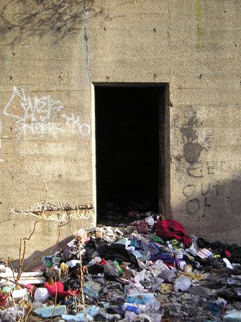 This is a doorway near the entrance to the tunnel.  Someone is living just inside here.