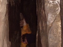 a lot of the corridors were very narrow in the maze.  this is a spot i didnt think i would make it through.  i found myself suspended in the air between 2 rock walls.